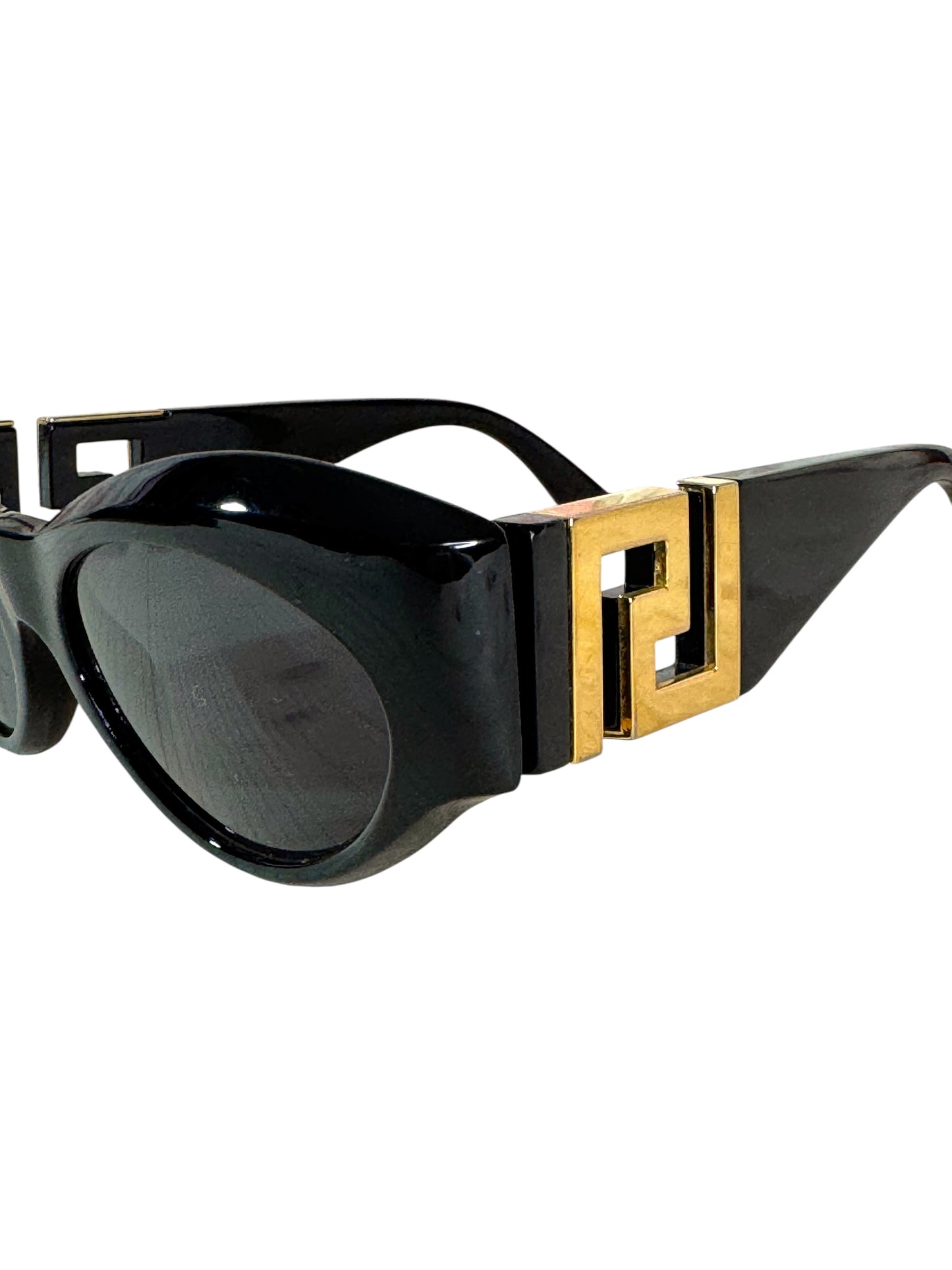 Occhiali da sole vintage Gianni Versace anni ’90 nero con logo Greca dorato