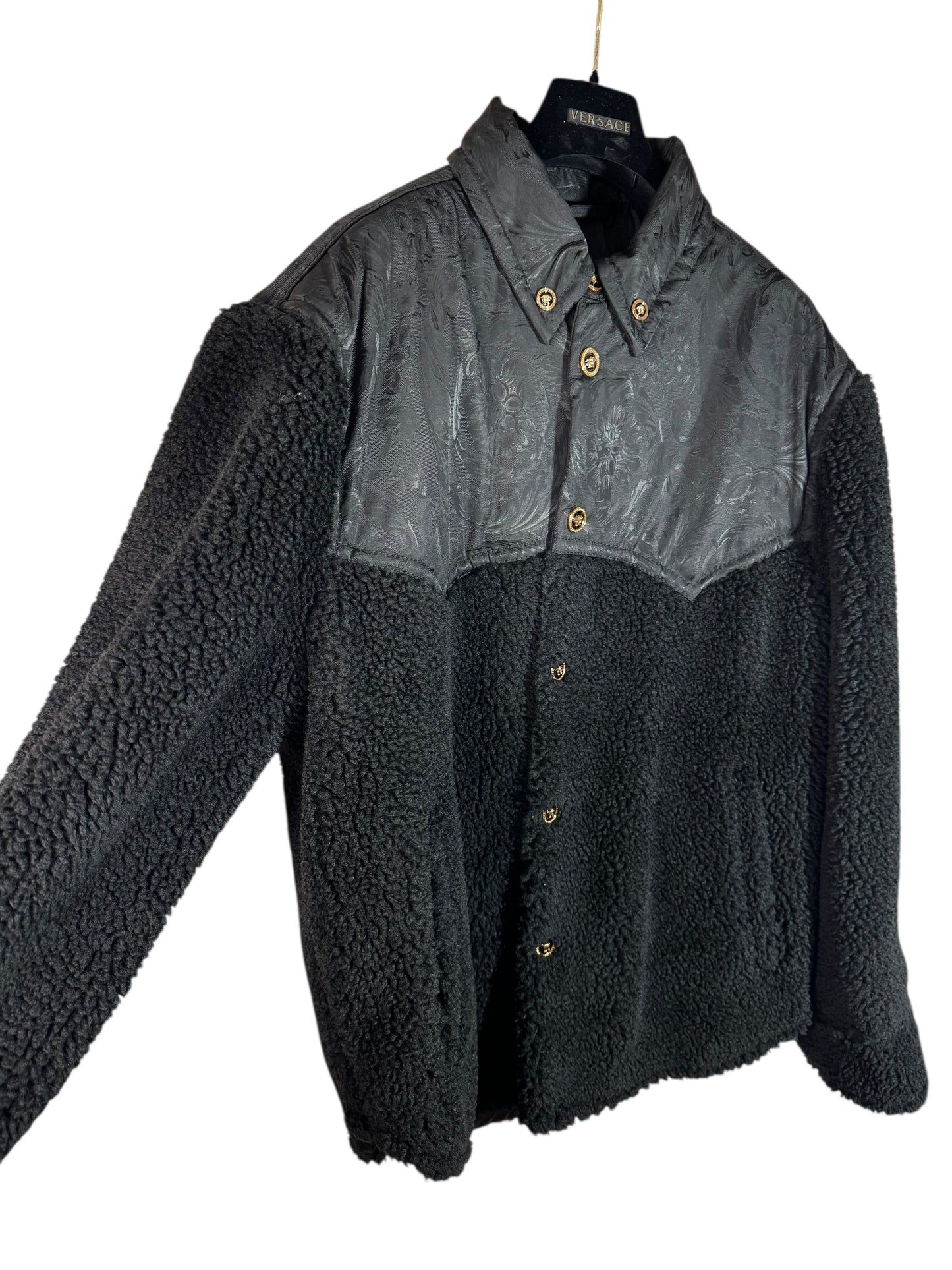 Giacca Versace nera in eco shearling con inserti jacquard
