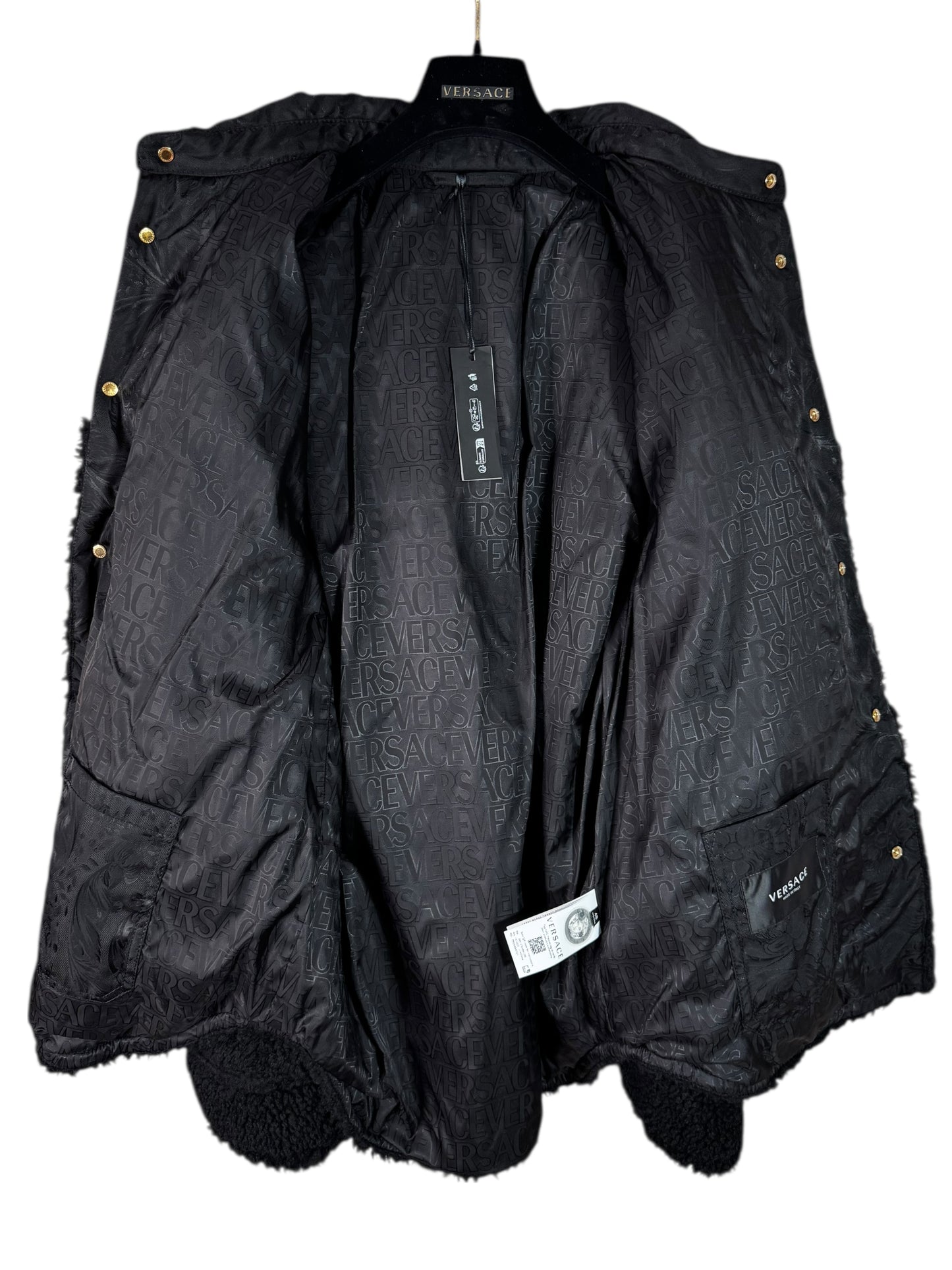 Giacca Versace nera in eco shearling con inserti jacquard