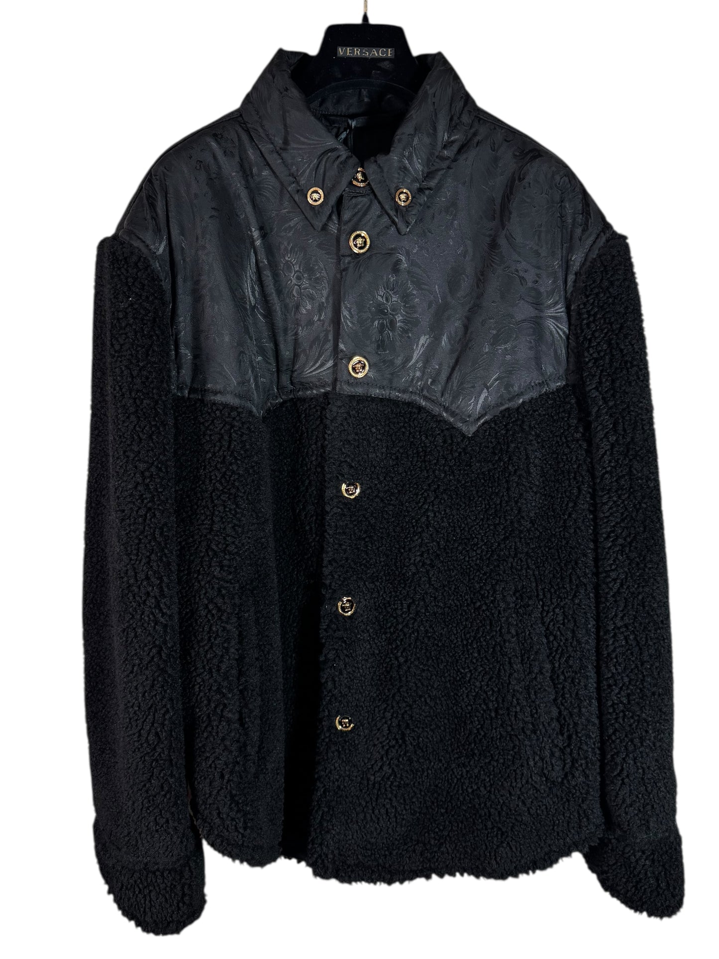 Giacca Versace nera in eco shearling con inserti jacquard