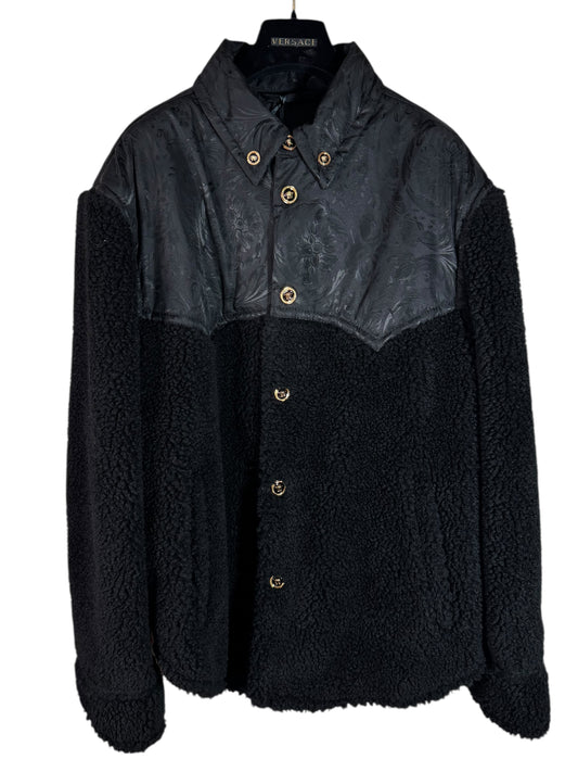 Giacca Versace nera in eco shearling con inserti jacquard