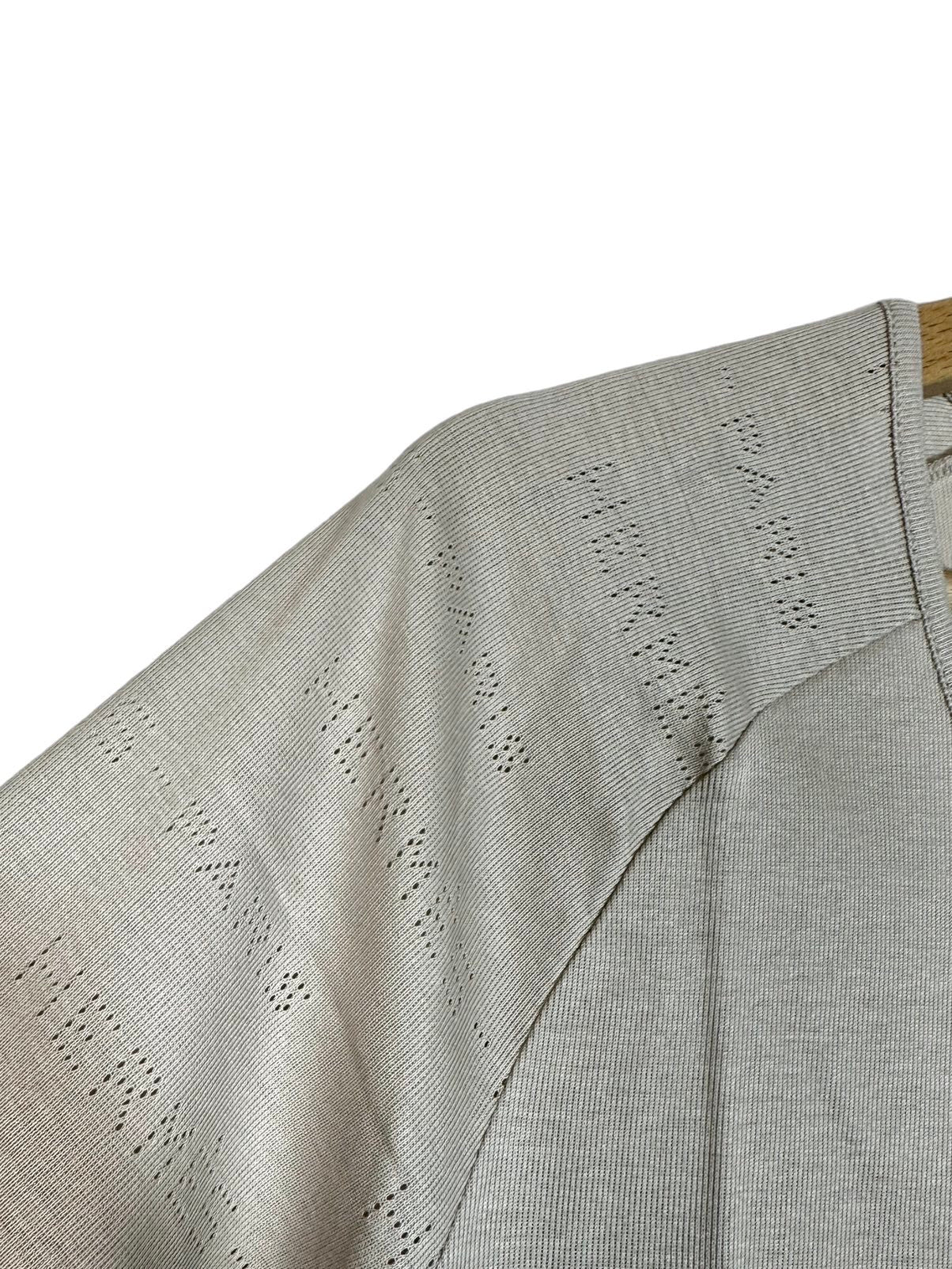 Hermès maglia con logo traforato. (L)