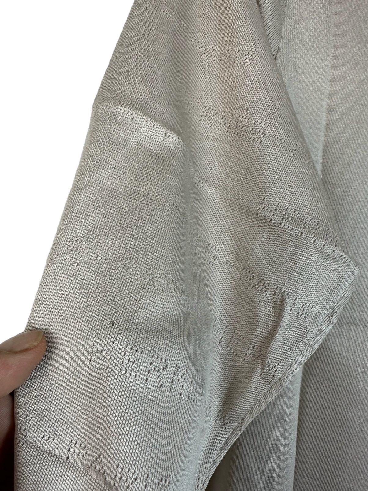 Hermès maglia con logo traforato. (L)