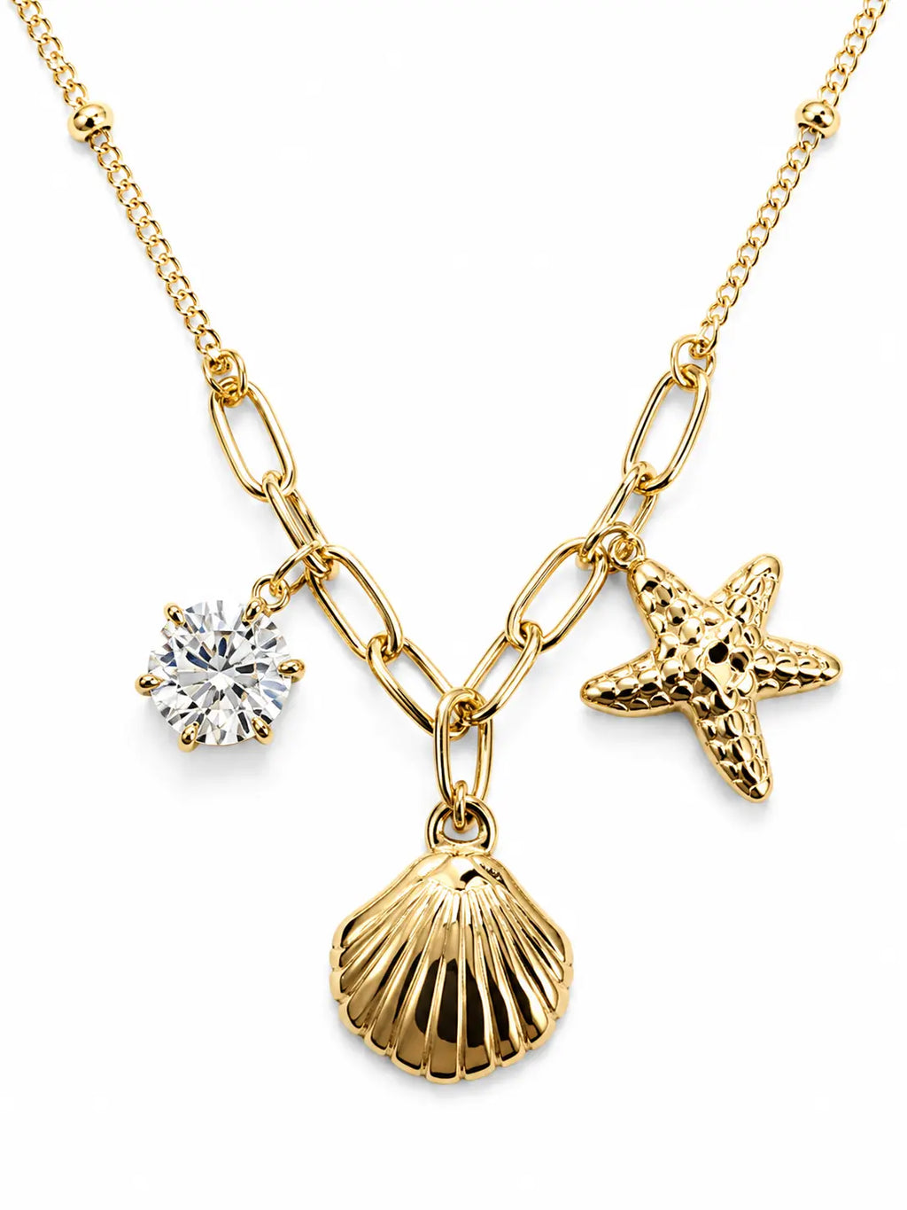 Collana dorata con conchiglia, stella marina e punto luce