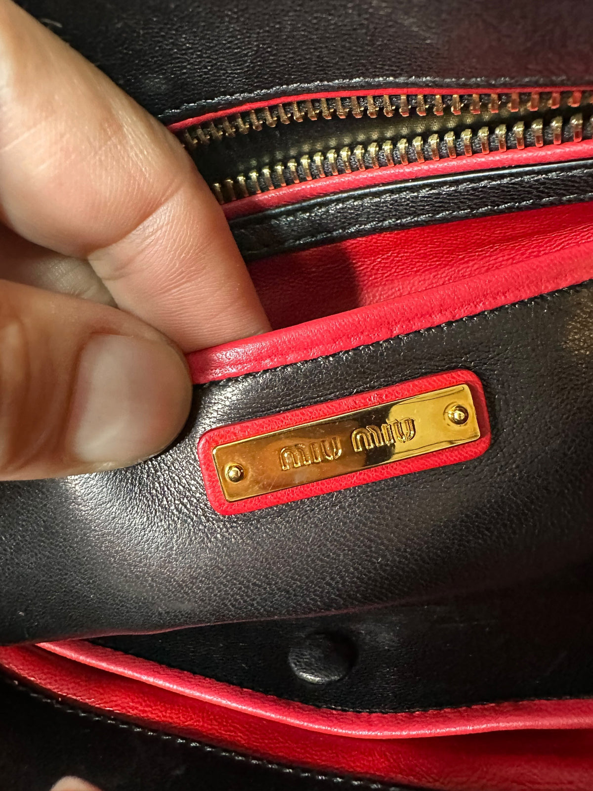 Miu Miu pochette in pelle matelassè