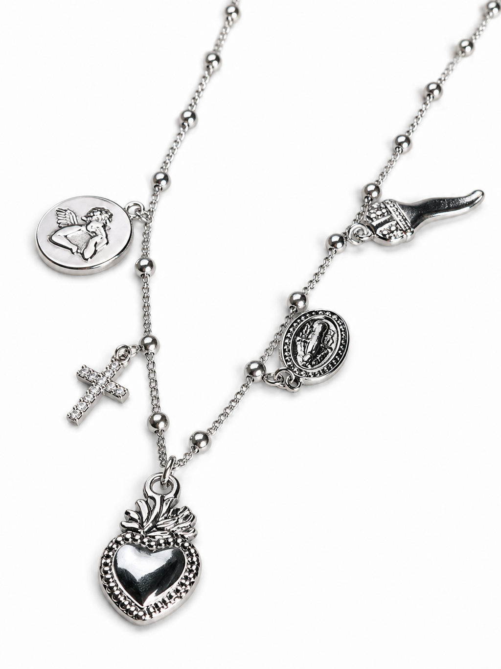 Collana argentata con cuore sacro e charms votivi