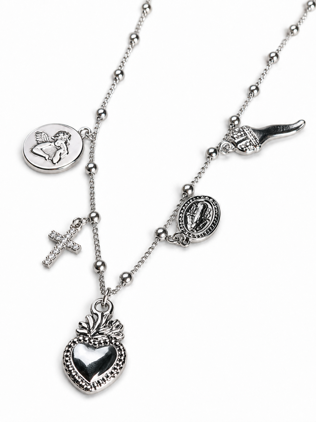 Collana argentata con cuore sacro e charms votivi