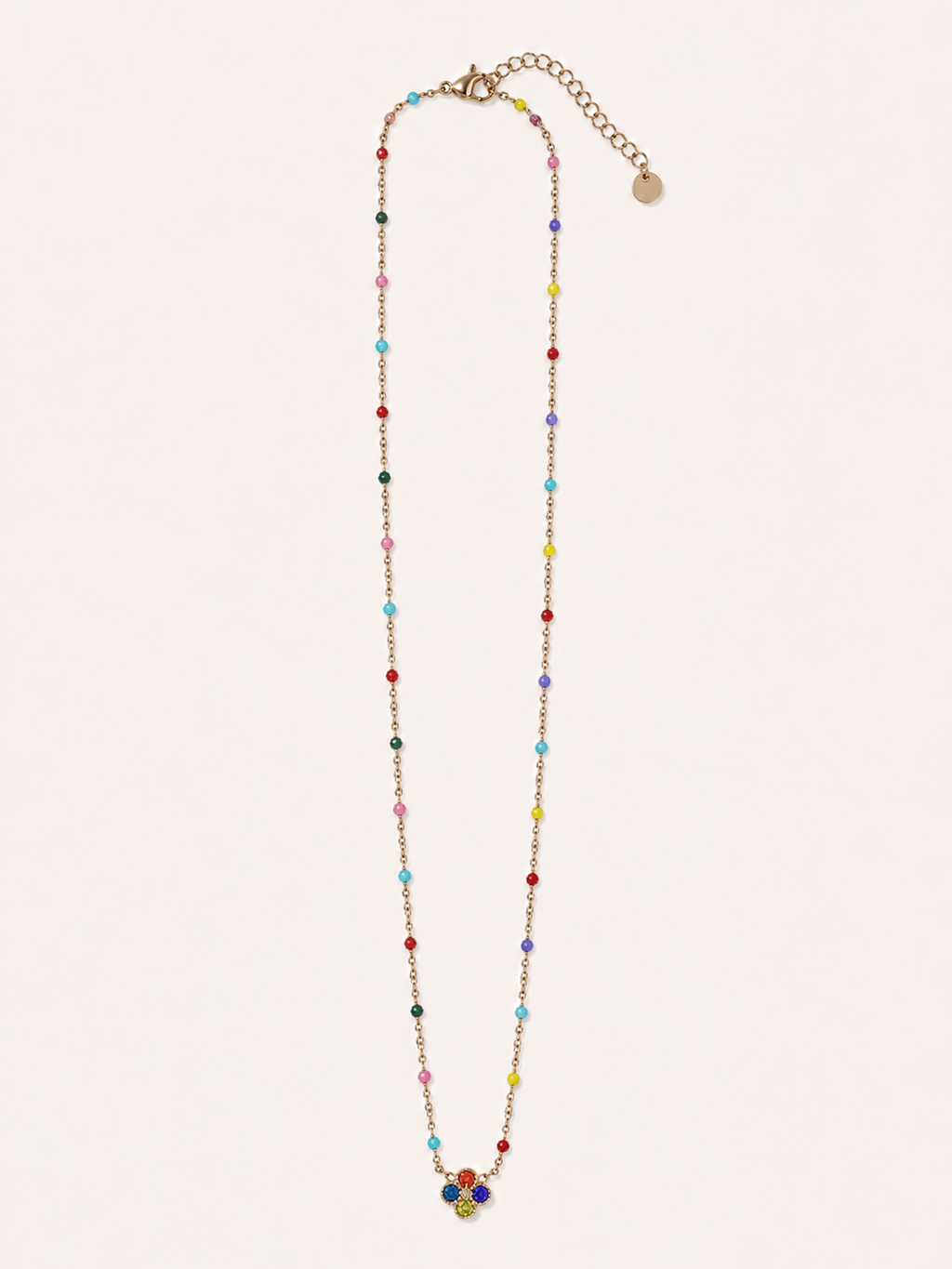 Collana dorata con fiore e cristalli multicolor