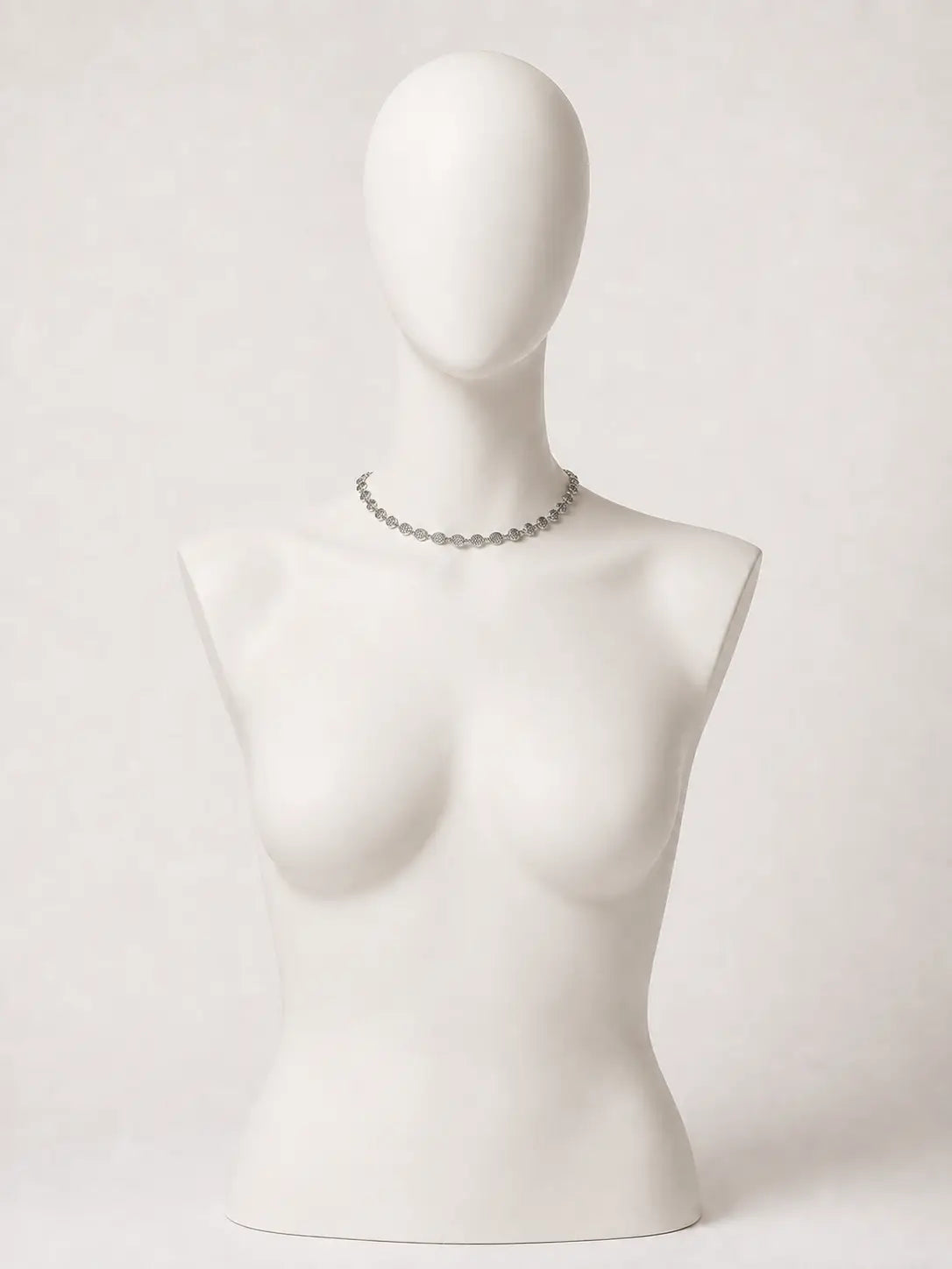 Collana argentata con medaglioni martellati