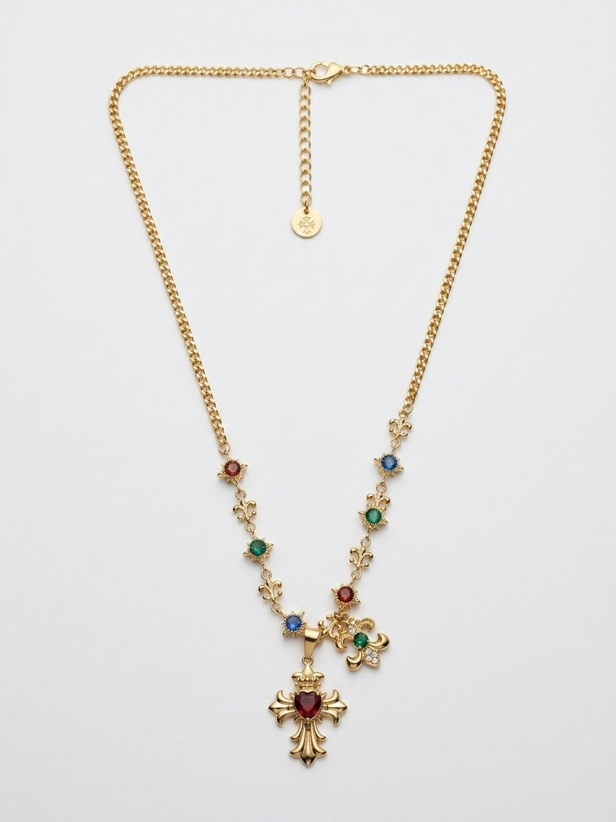 Collana dorata con croce e charms multicolor