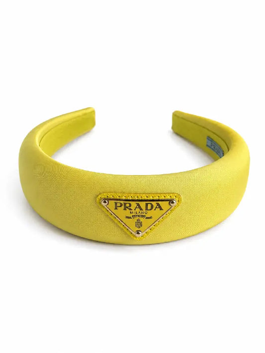 Prada cerchietto imbottito giallo con logo triangolo - taglia grande