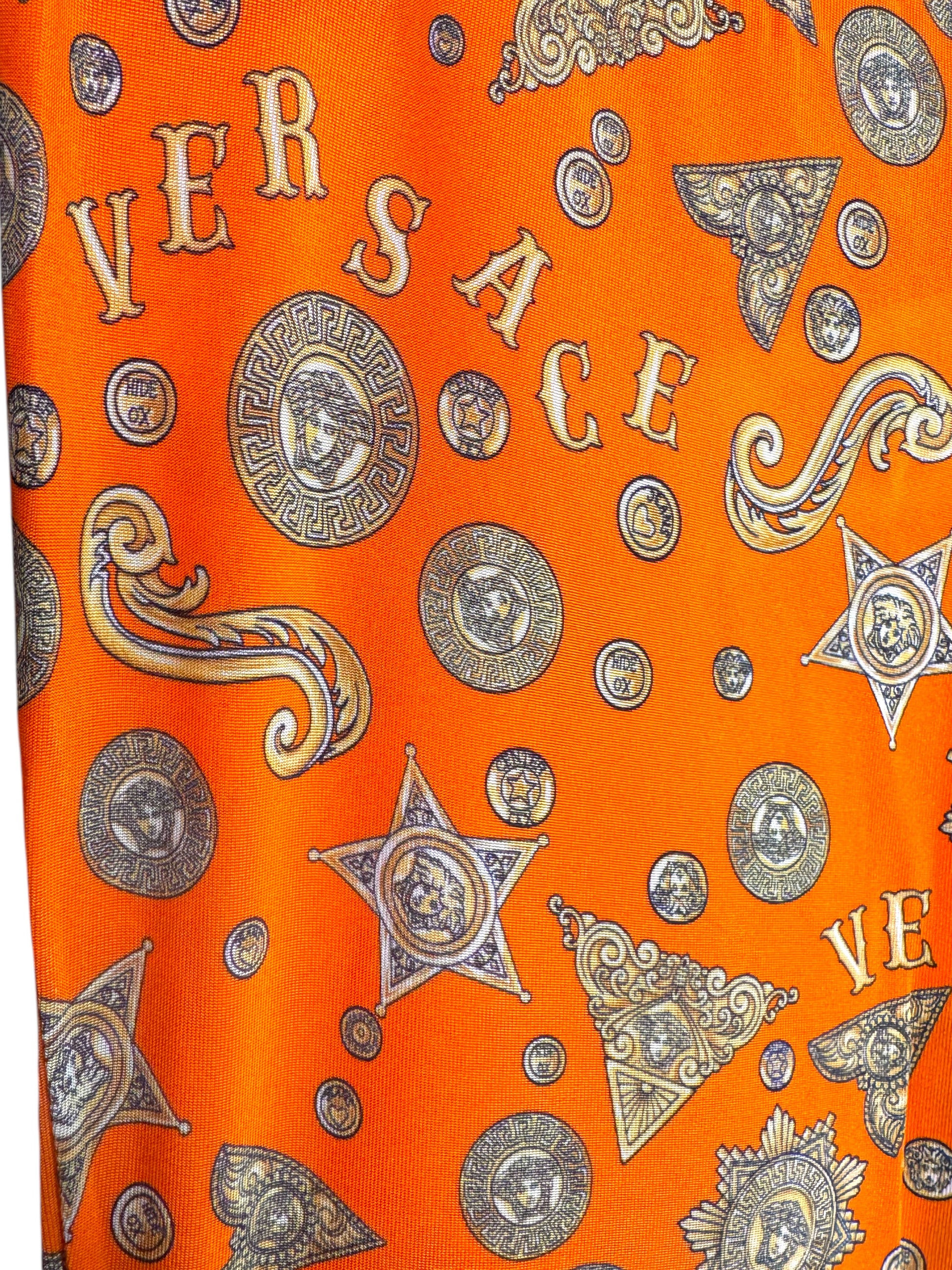 Pantaloni Versace arancioni stampa medusa monete taglia 42 nuovi — foto 2