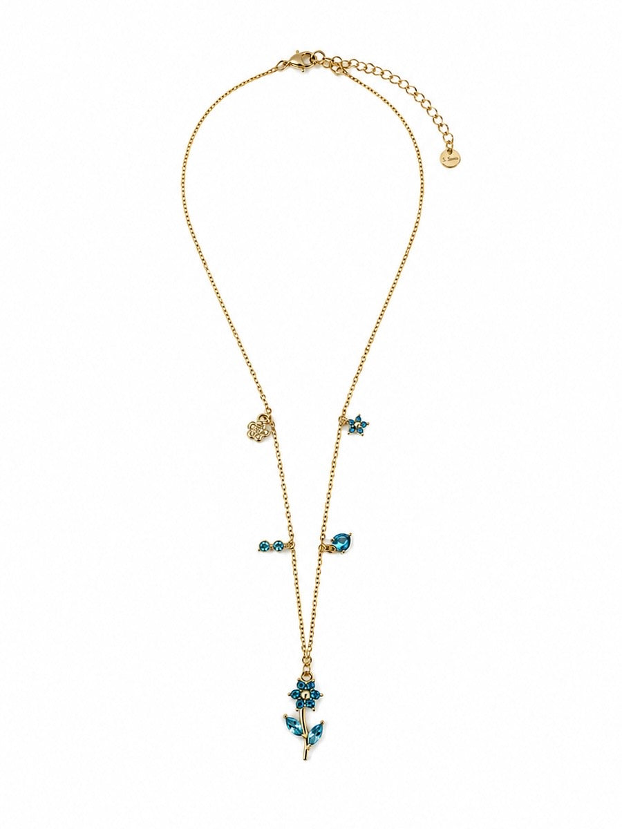 Collana dorata con fiore e cristalli azzurri