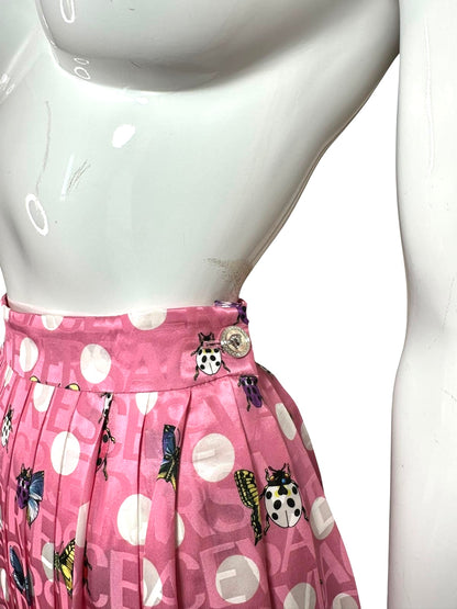 Versace gonna midi plissettata rosa con pois e stampa farfalle e coccinelle