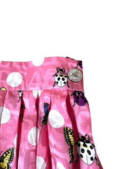 Versace gonna midi plissettata rosa con pois e stampa farfalle e coccinelle