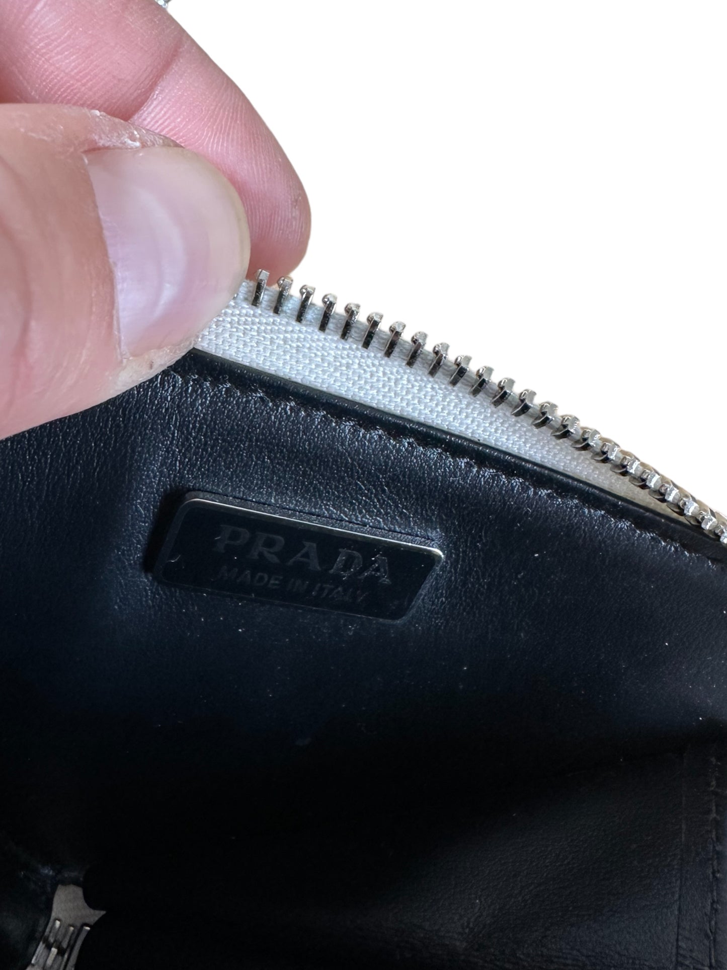 Prada mini accessorio in pelle