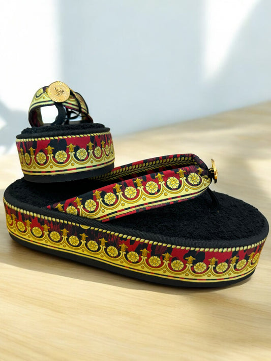 Versace infradito tema barocco