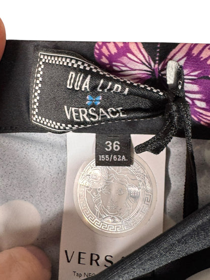 Leggings Versace Dua Lipa neri a pois con farfalle e coccinelle taglia 36 — foto 2