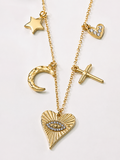 Collana dorata con charms cuore, luna e stella