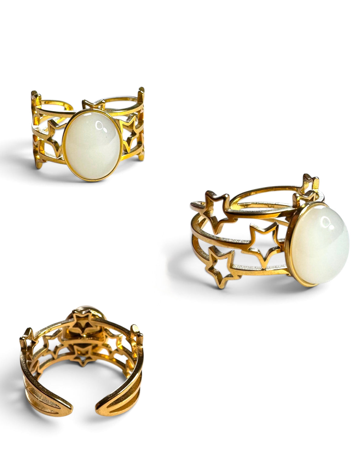 Anello regolabile dorato con stelle e cabochon bianco