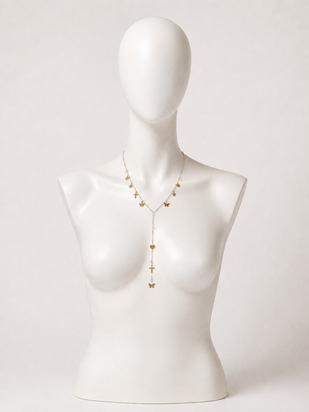 Collana a Y dorata con charms cuore, stelle e farfalle