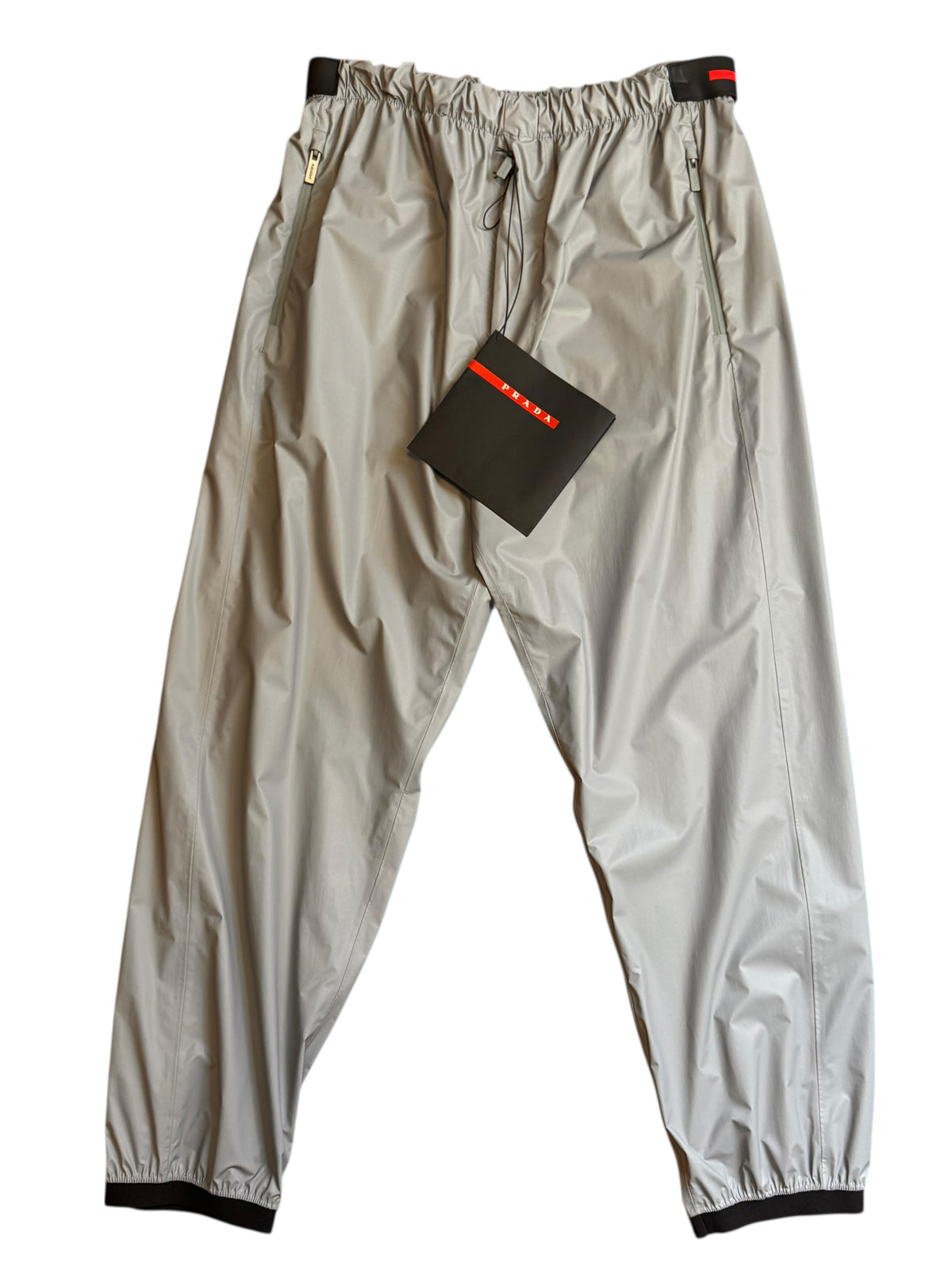 Prada pantaloni tecnici nylon grigio bande nere logo rosso tg 52 nuovi