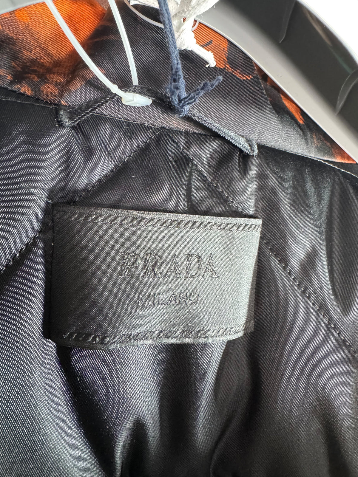 Prada giacca tecnica arancione e nera con cintura taglia L