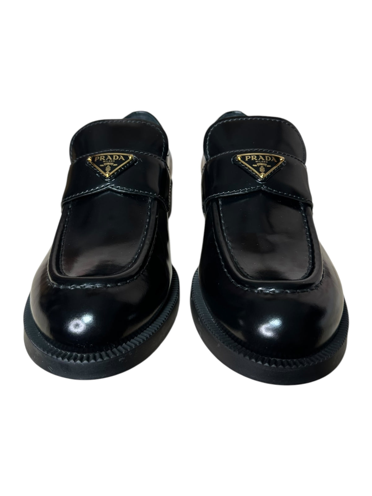 Mocassini Prada donna in pelle nera con logo triangolare dorato, taglia 37